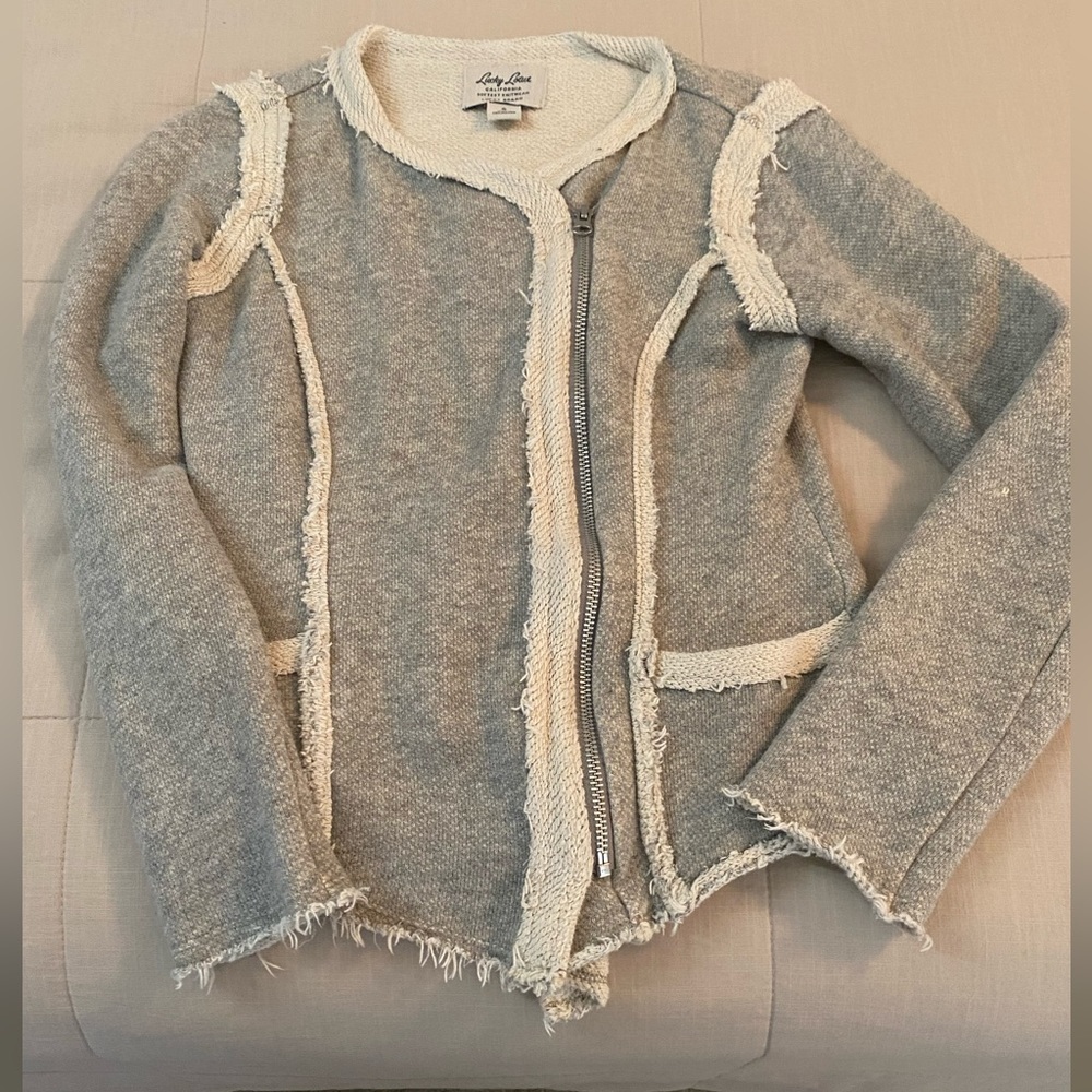 Women’s Lucky small gray and cream jacket.
